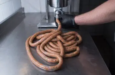 chef makes minced pork sausages