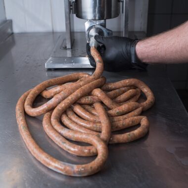 chef makes minced pork sausages